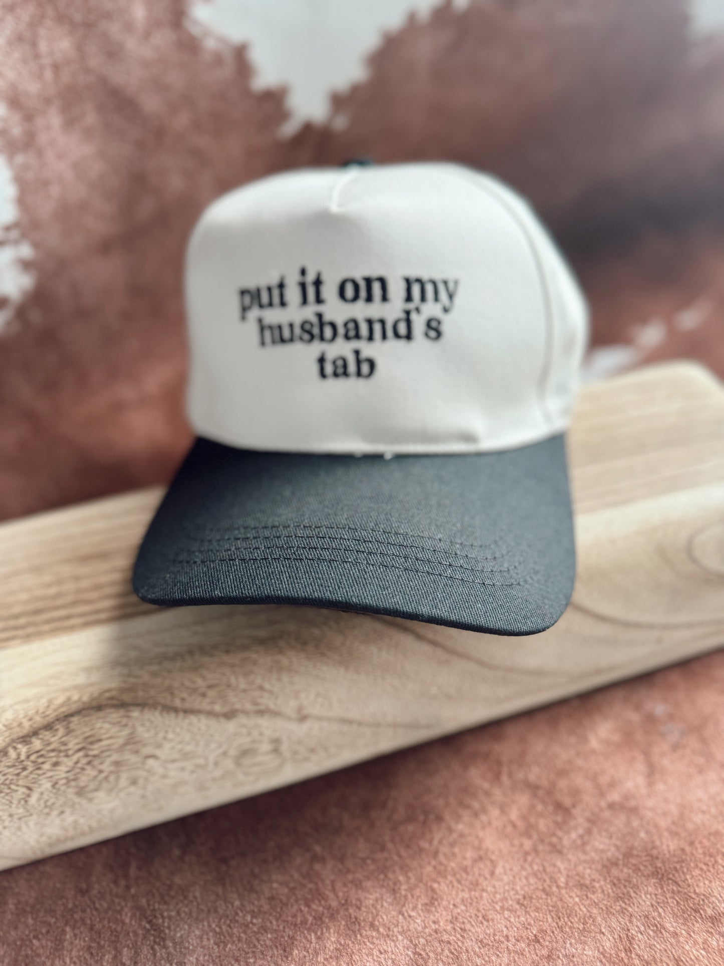 Put it on my husband tab trucker hat