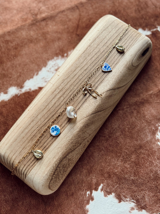 The Bombshell Bow Charm Necklace